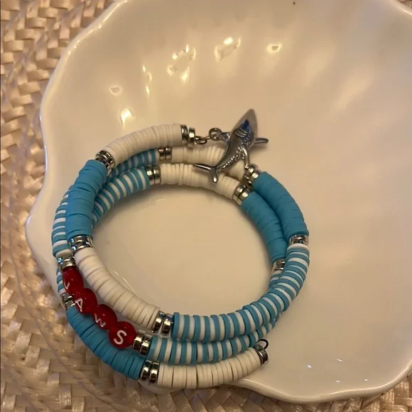Blue and White Beaded Bracelet with Red Letter Accents Spelling Jaws - Picture 5 of 5